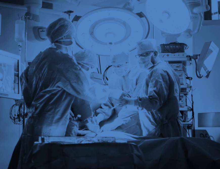 physicians in a surgical room with a blue color overlay