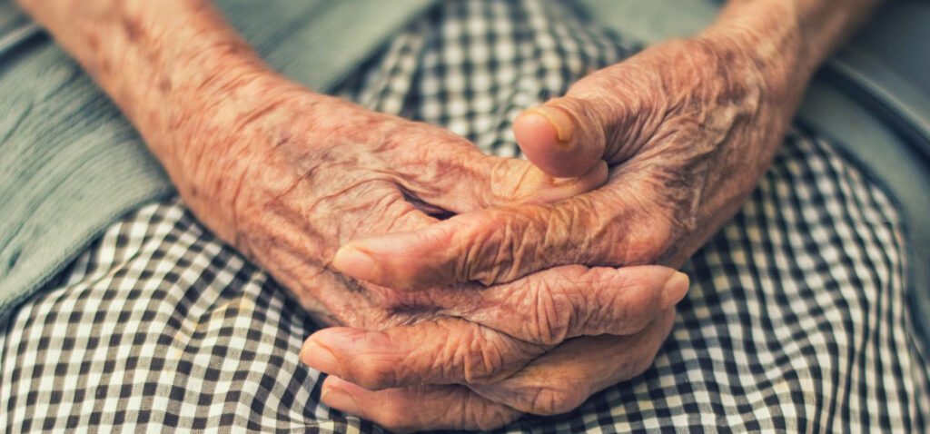 zoomed in photo of an elderly person's hands