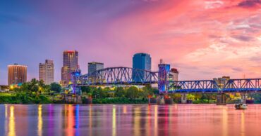 Little Rock, Arkansas skyline on the Arkansas River at dusk