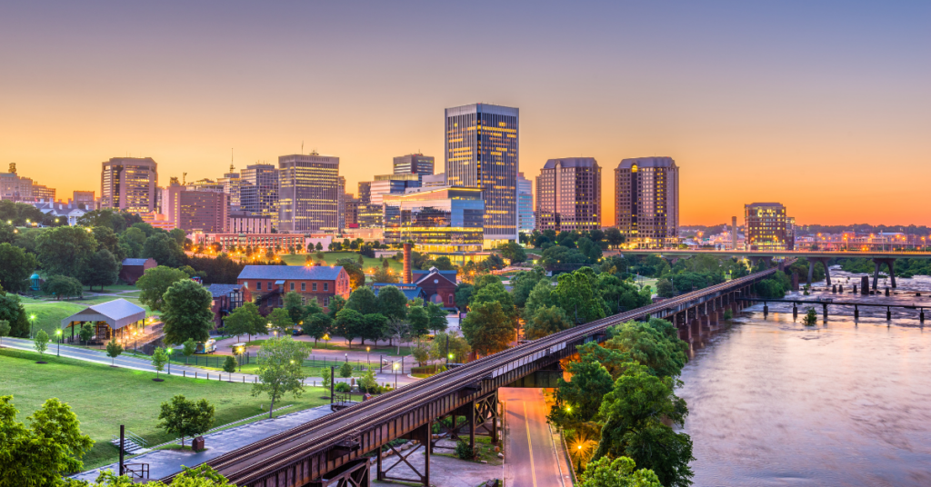 Richmond, Virginia downtown skyline by the river at twilight