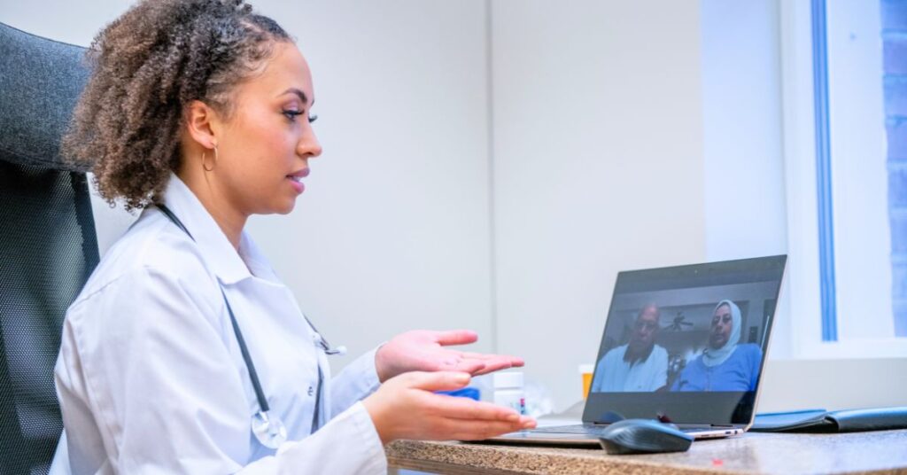 female physician conducting virtual telehealth consultation for rural patient