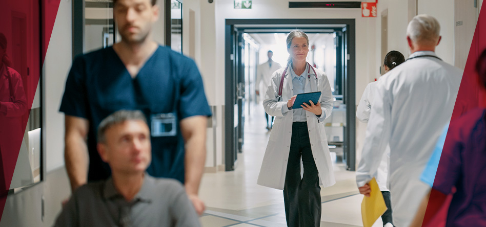 women in white lab coat walking down a hallway